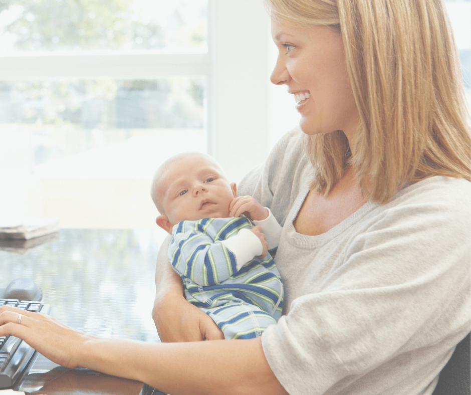woman with baby at computer